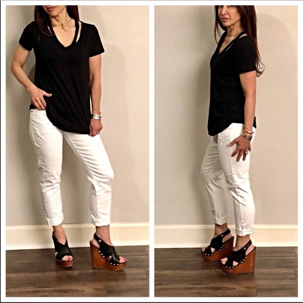 Distressed white skinny jeans